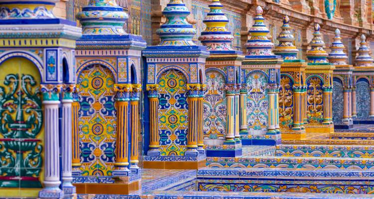 Close-up of colorful tiled columns.