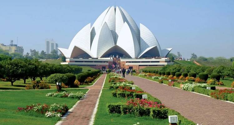 Lotus-shaped temple with a garden pathway.