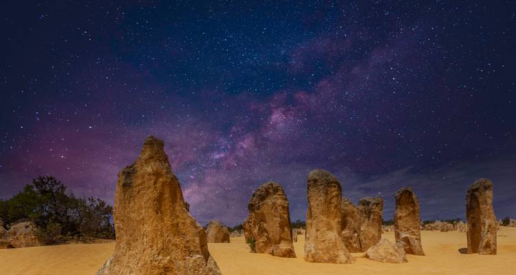 Pinnacles under a starry night sky.