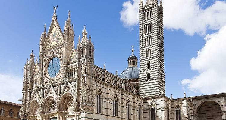 The facade of a magnificent cathedral with ornate architecture.