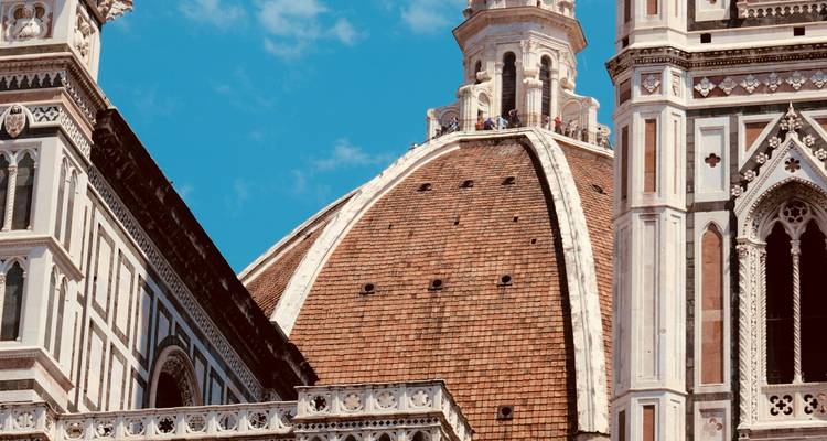 Close-up of Florence Cathedral dome against a blue sky