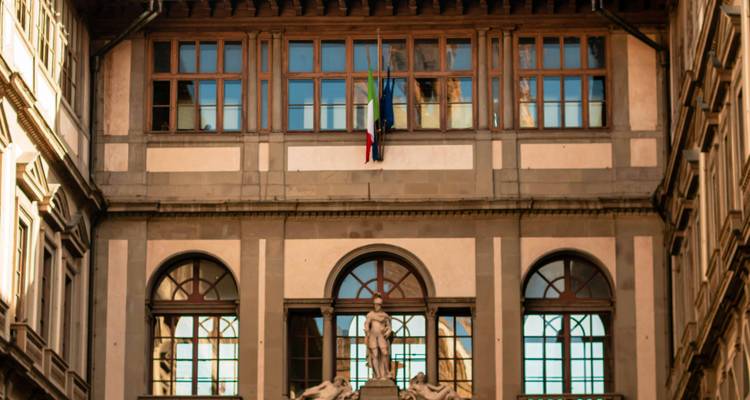 Facade with windows and statues in a historic building