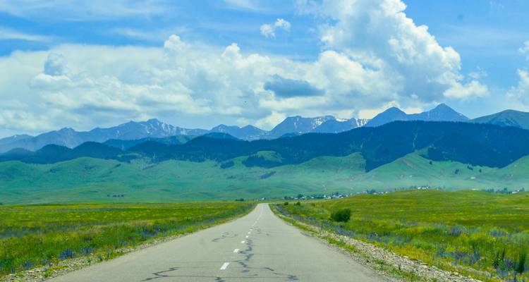Scenic road leading into mountains.