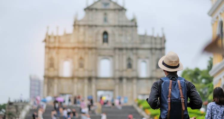 Tourist in front of Ruins of St. Paul's in Macau.