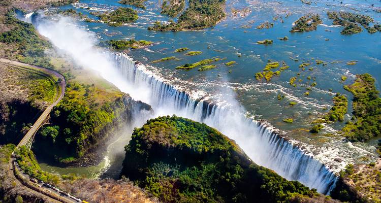 Aerial view of Victoria Falls with surrounding landscape.