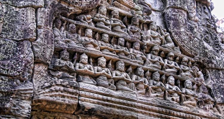 Intricate stone carvings on a temple wall.