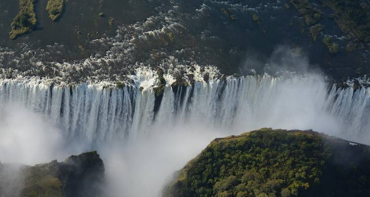 Aerial view of a majestic waterfall.
