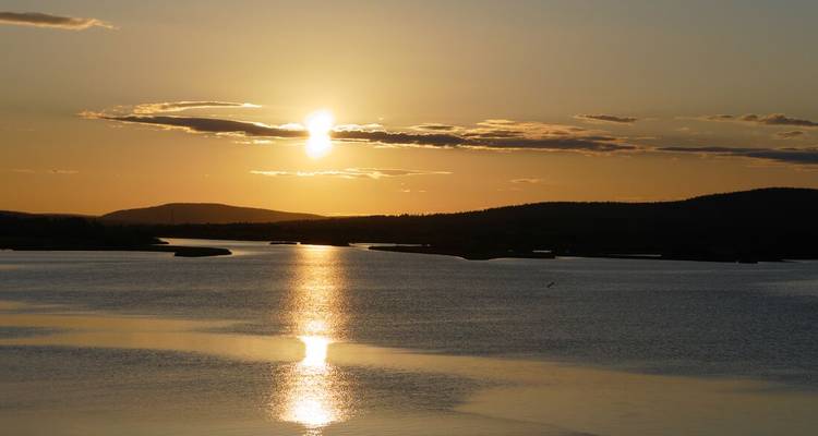 Beautiful sunset over a lake with reflections.