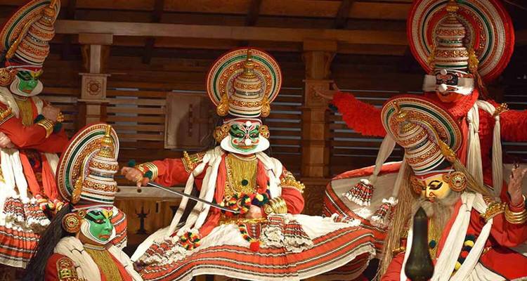 Dancers performing traditional Kathakali dance.