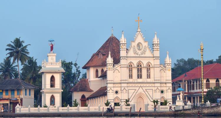 Exterior of a white church with intricate architecture.