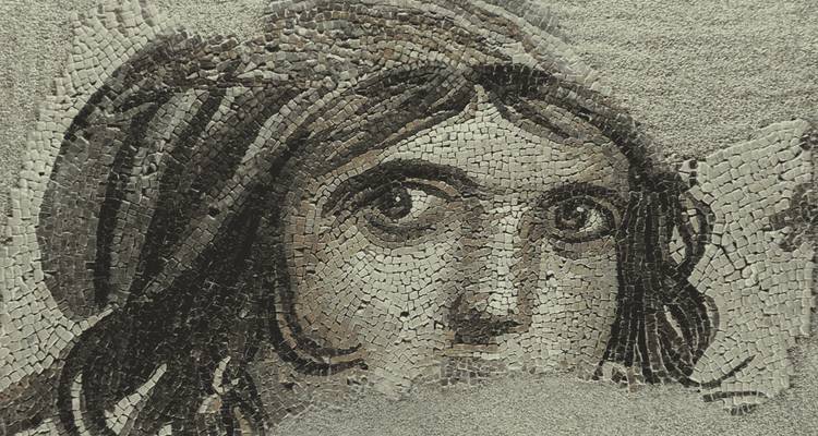 Mosaic art of a woman's face.