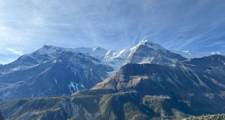 Majestic mountains with snow and clear sky.