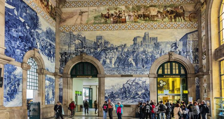 Interior of a building with detailed blue tile art.
