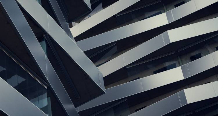 Close-up of modern architectural building with geometric design.