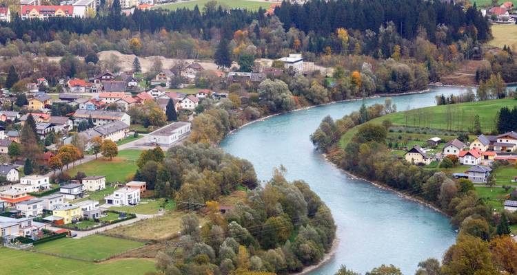 River winding through a picturesque town.