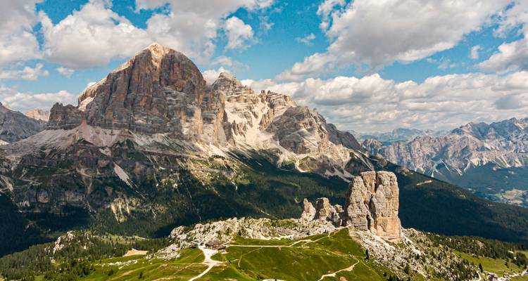 Mountain landscape with a clear sky and rugged peaks.