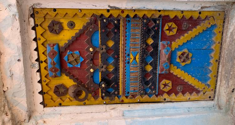 Colorful decorative door with geometric patterns.