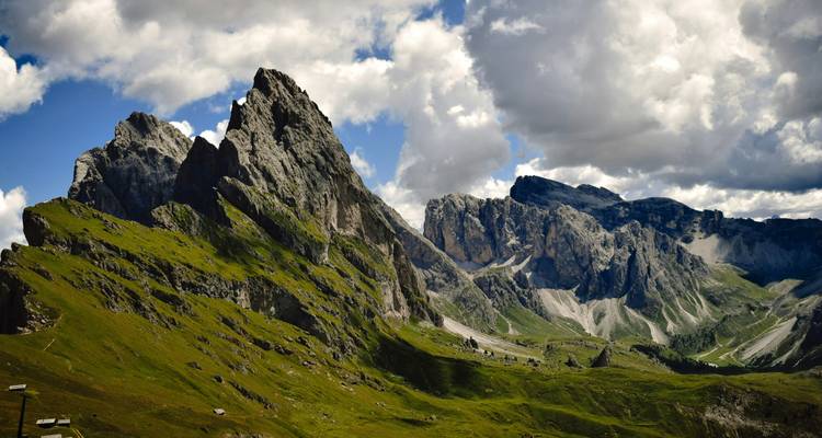 Dramatic mountain peaks with rugged terrain.