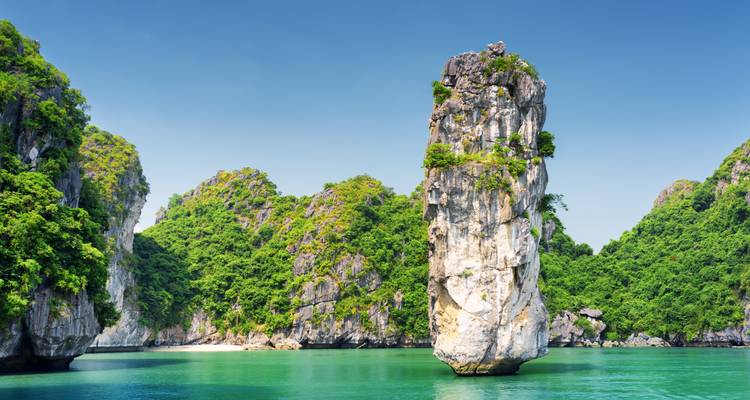 Dramatic limestone karsts in emerald waters