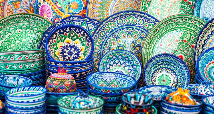 Colorful ceramic plates on display.