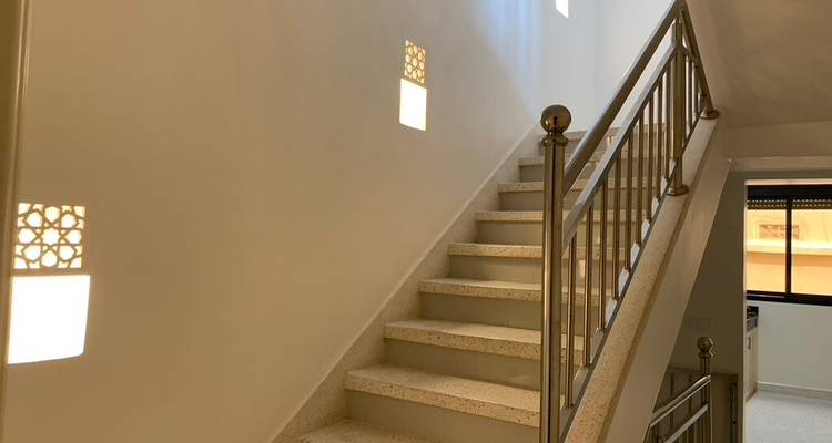Staircase in a modern home with decorative accents.
