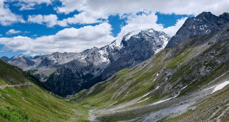 Majestic mountain range with green valley.