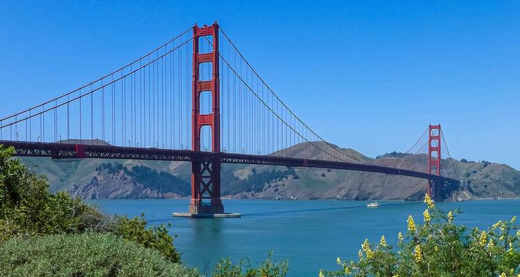 A scenic view of the Golden Gate Bridge spanning across the San Francisco Bay.