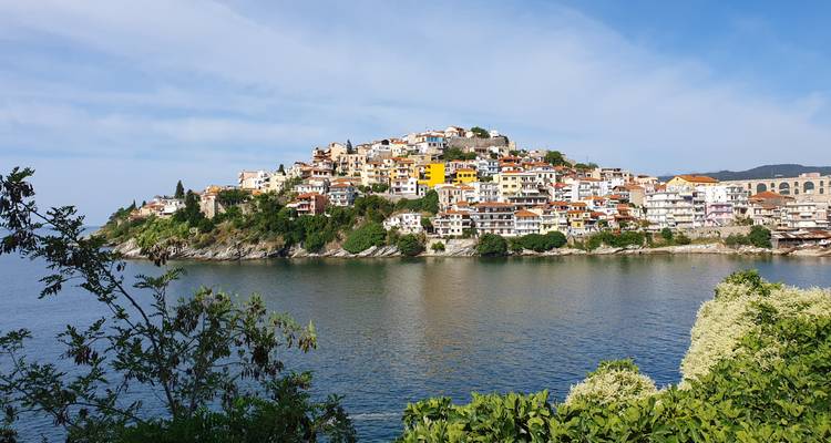 Vibrant hillside town overlooking the sea in Greece.