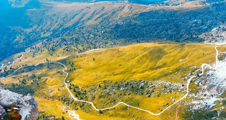 Aerial view of a mountainous landscape with trails.