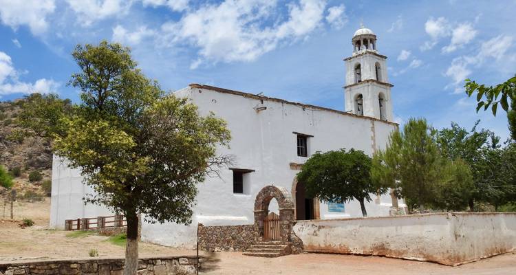 A historic church building in a rural setting.
