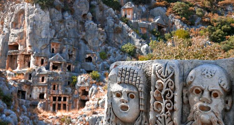 Stone-carved masks in an archaeological site.