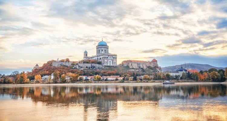 View of the Esztergom Basilica on a hill by the river.