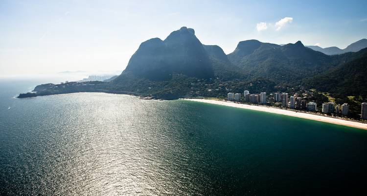 Aerial view of the beach and mountains in Rio de Janeiro.