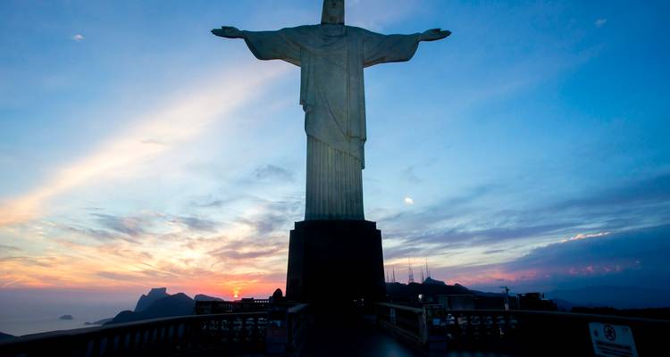 Christ the Redeemer statue at sunset in Rio de Janeiro.