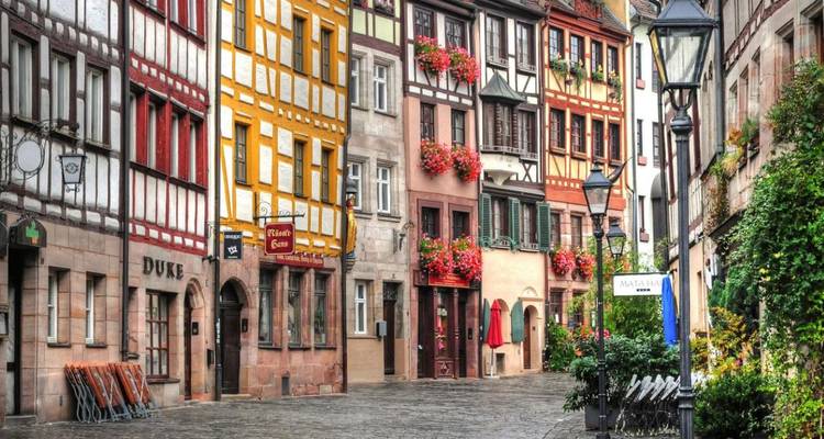 Quaint street with colorful, historic buildings.