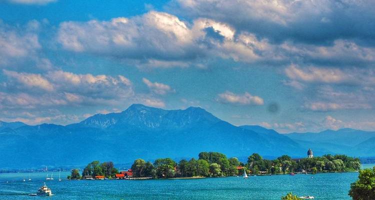 Scenic view of a lake with mountains in the background.