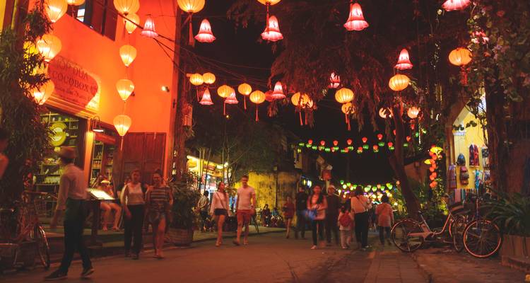 Street in Hoi An lit with colorful lanterns