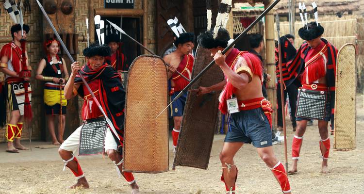 Traditional dancers in colorful tribal attire.