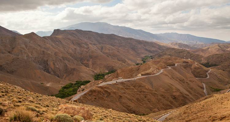 Winding road through rugged mountainous terrain.
