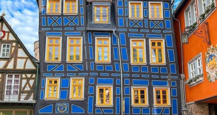 Colorful half-timbered houses in a historical neighborhood.