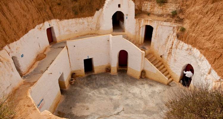Troglodyte homes built into the desert landscape.