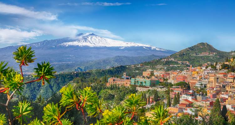 A view of Taormina with Mount Etna in the background.
