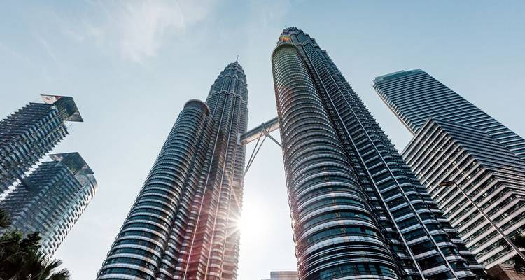 Iconic skyscrapers reaching into a clear blue sky.