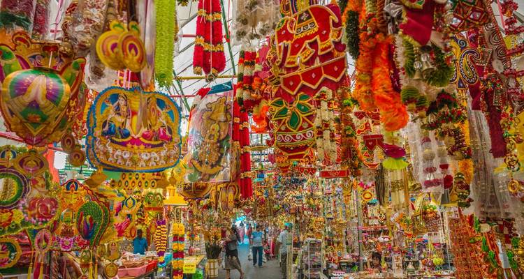 A vibrant and colorful market filled with hanging decorations.