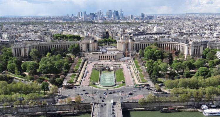 Panoramic view of the Trocadéro Gardens with the Eiffel Tower in the distance.