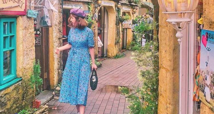 Tourist walking through a picturesque alley.
