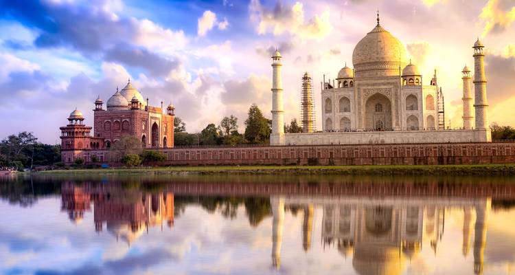 The Taj Mahal in Agra, India, viewed from across the river at sunset.