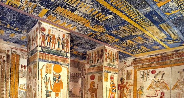 Colorful and intricate ancient Egyptian paintings on a temple wall.