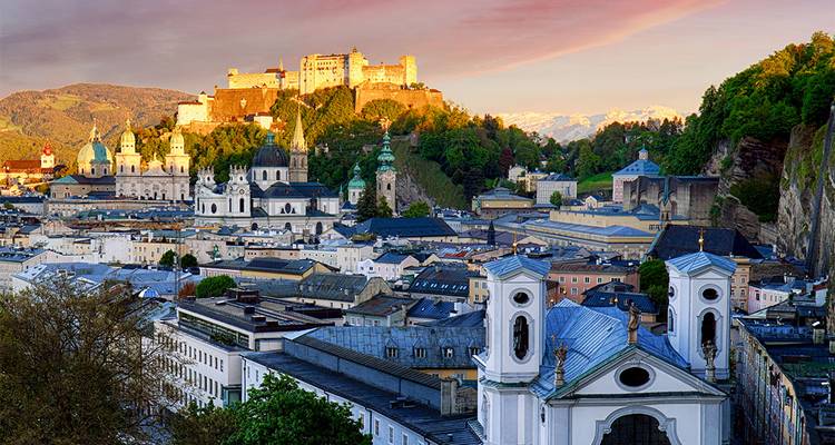 Salzburg cityscape with fortress.