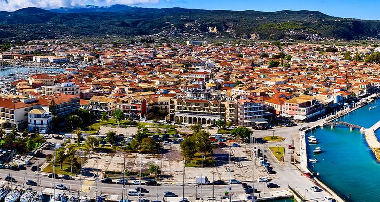 Group standing in front of a historical cathedral on a sunny day.
